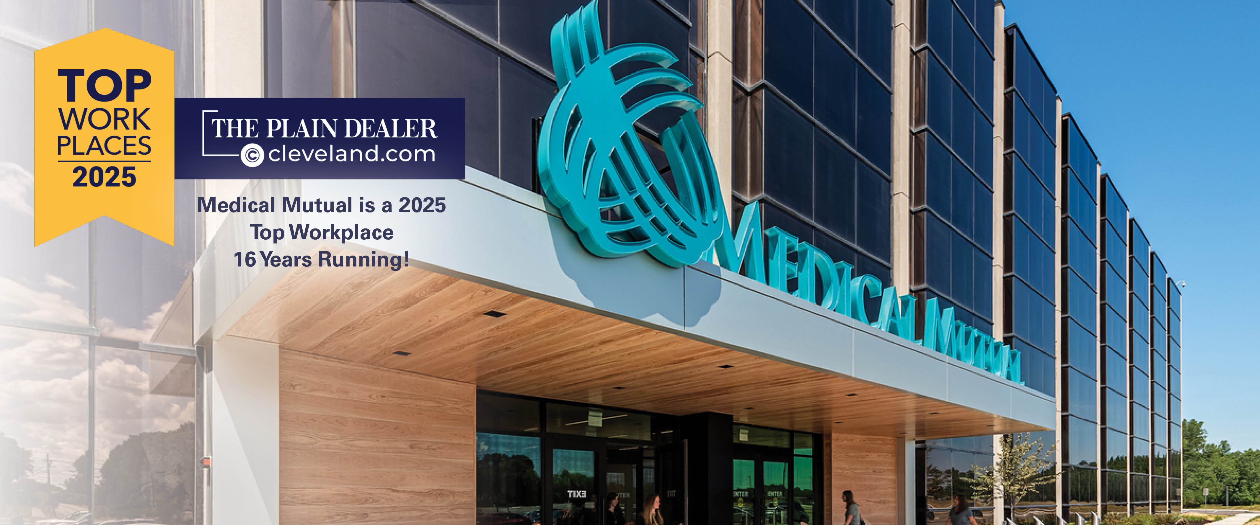 The exterior of the Medical Mutual office building with a ribbon reading: "Top Work Places 2025".