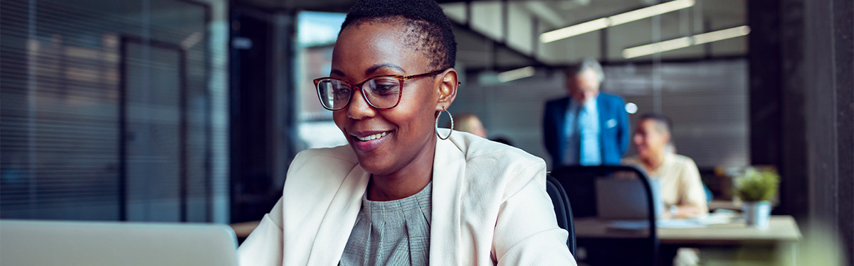 Woman sitting at desk.