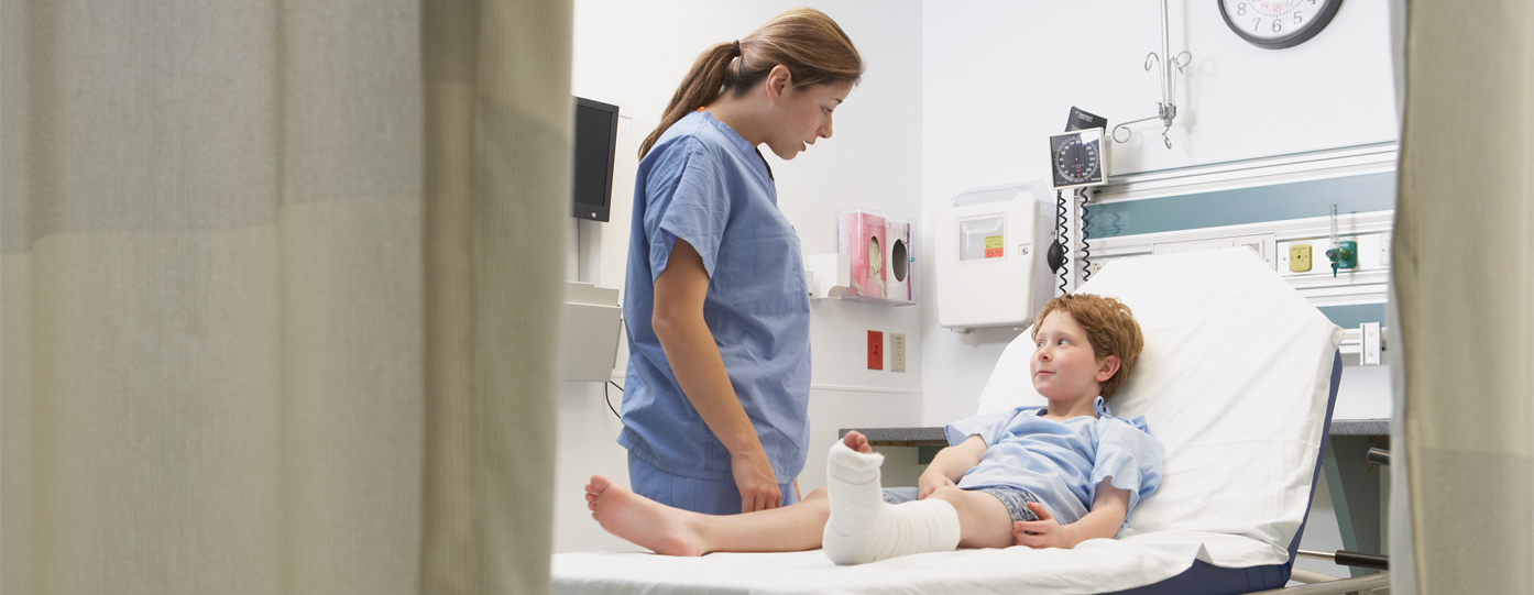 Photo of boy with broken leg in hospital